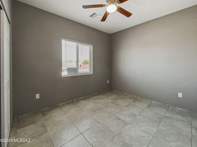 unfurnished room featuring ceiling fan