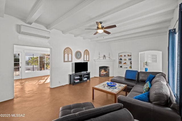 living area with a wall mounted air conditioner, beamed ceiling, built in shelves, a warm lit fireplace, and finished concrete floors