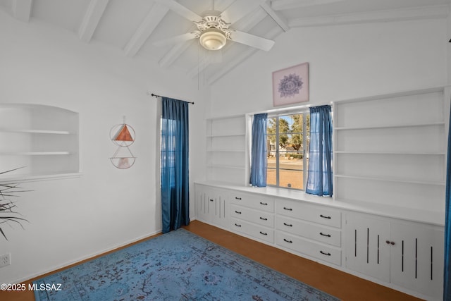 unfurnished bedroom with baseboards, a ceiling fan, and vaulted ceiling with beams