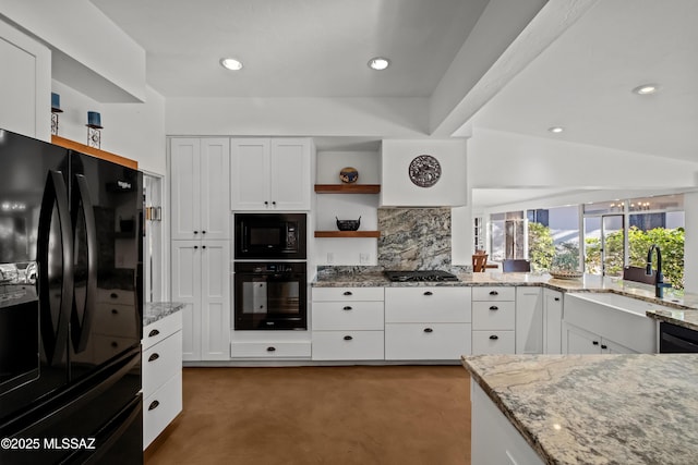 kitchen featuring a sink, white cabinets, black appliances, and open shelves