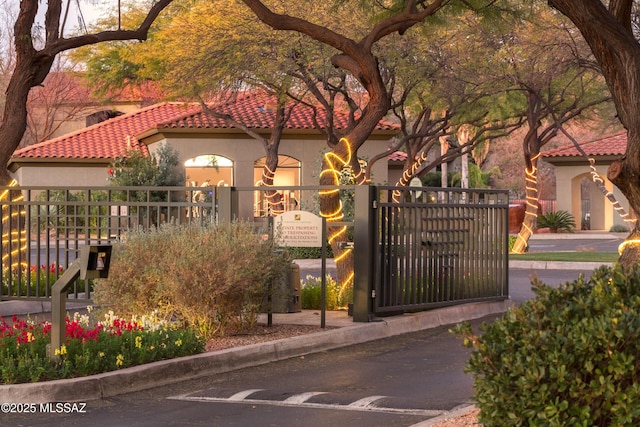 exterior space featuring a gate and fence