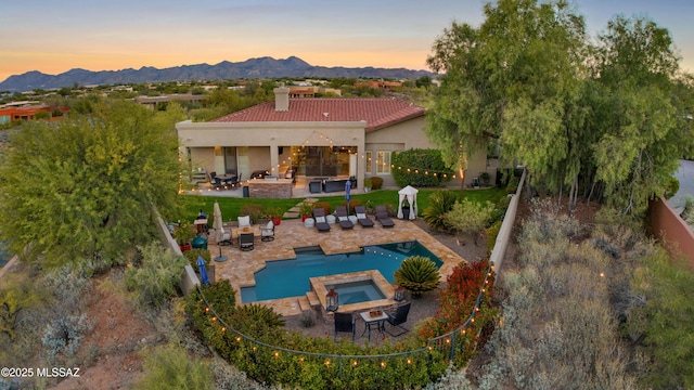 exterior space featuring a mountain view