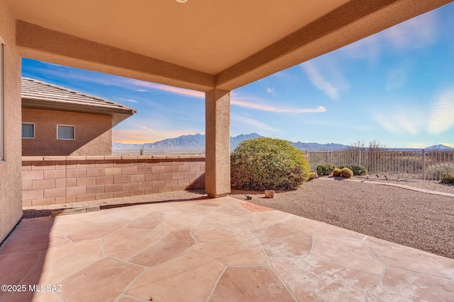 view of patio / terrace featuring a mountain view