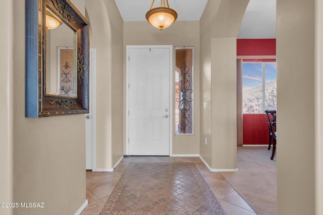 entrance foyer featuring tile patterned flooring