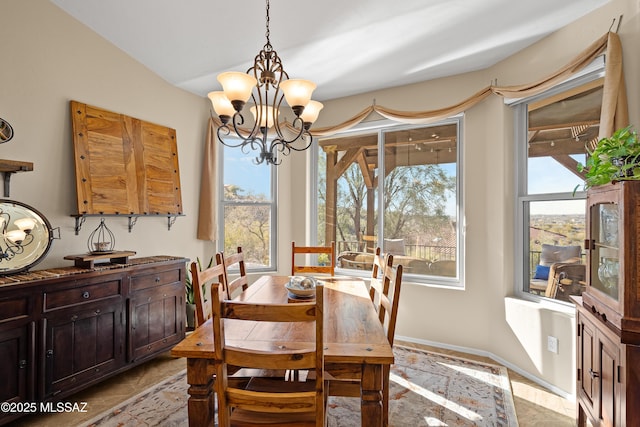 dining area featuring a chandelier