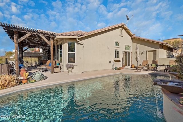 back of house featuring a pergola and a patio area