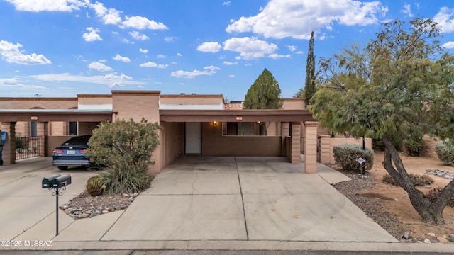 view of front of house with a carport