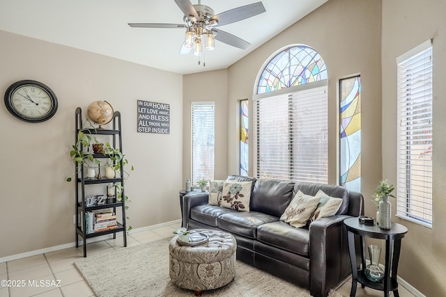 tiled living room featuring ceiling fan