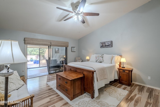 bedroom with access to exterior, ceiling fan, light hardwood / wood-style flooring, and vaulted ceiling