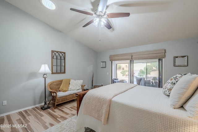 living room featuring hardwood / wood-style floors and lofted ceiling