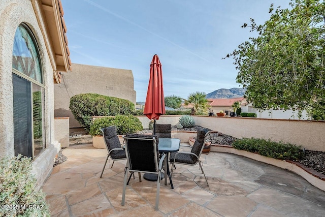 view of patio featuring a mountain view