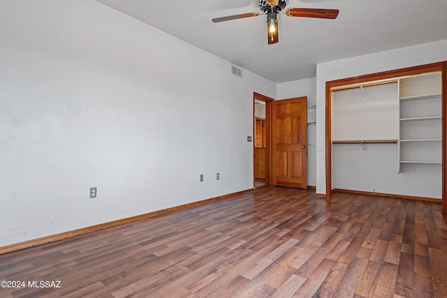 unfurnished bedroom featuring a closet, ceiling fan, and hardwood / wood-style floors