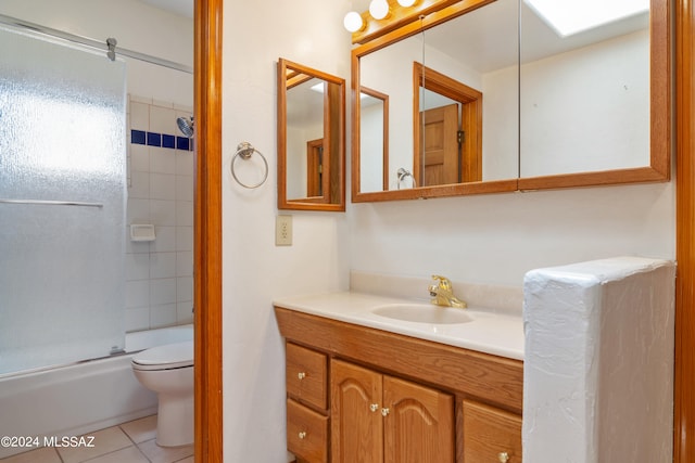 full bathroom with tile patterned flooring, vanity, toilet, and bath / shower combo with glass door