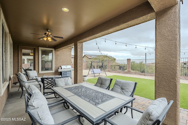 view of patio / terrace featuring grilling area, ceiling fan, and an outdoor hangout area