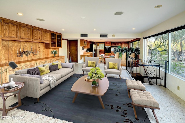 living room featuring wooden walls