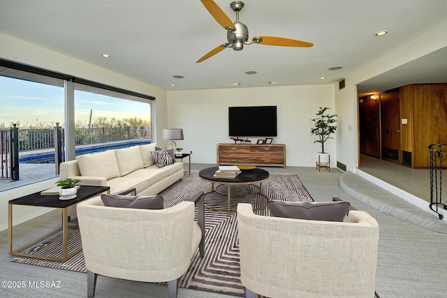 living room featuring ceiling fan