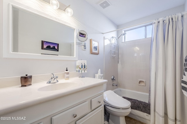 full bathroom featuring vanity, shower / bath combination with curtain, and toilet