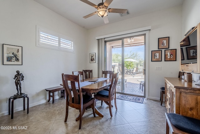 dining area featuring ceiling fan and light tile patterned floors