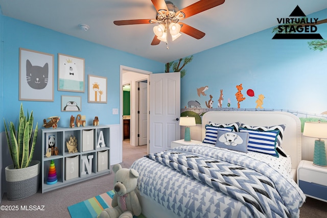 carpeted bedroom featuring ceiling fan