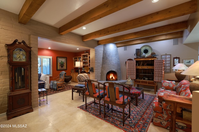 living room featuring beamed ceiling