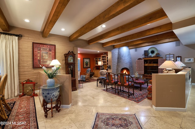 interior space featuring beamed ceiling and brick wall