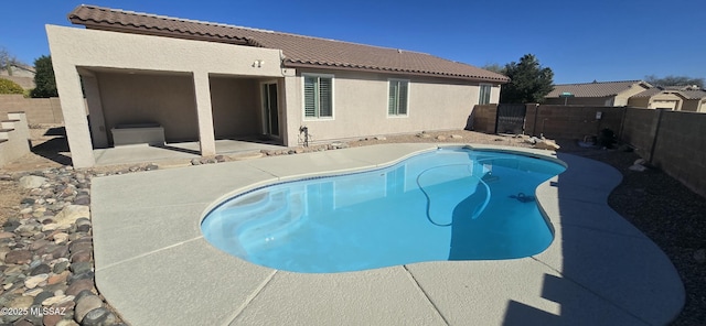 view of swimming pool featuring a patio