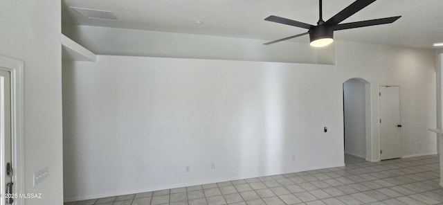 empty room featuring ceiling fan and light tile patterned floors