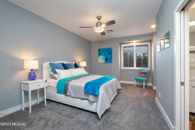 carpeted bedroom featuring ceiling fan