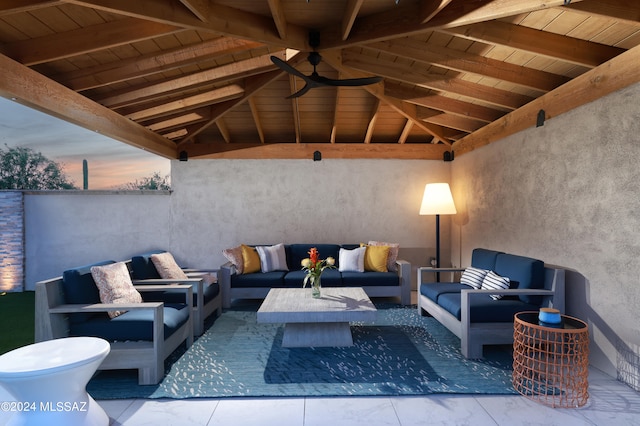 patio terrace at dusk with a gazebo and an outdoor living space