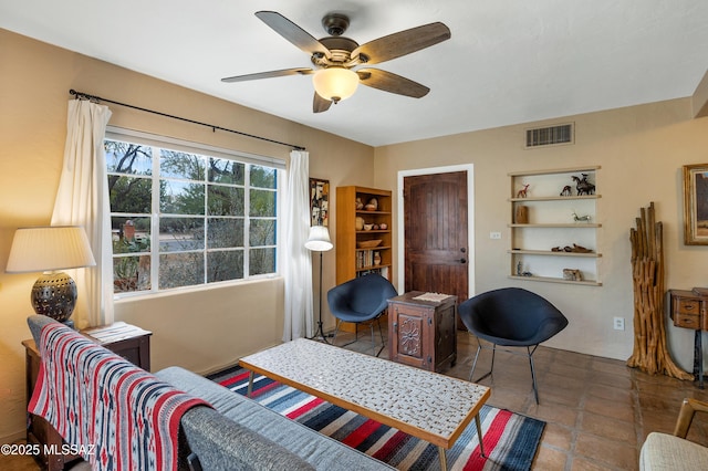 tiled bedroom with ceiling fan