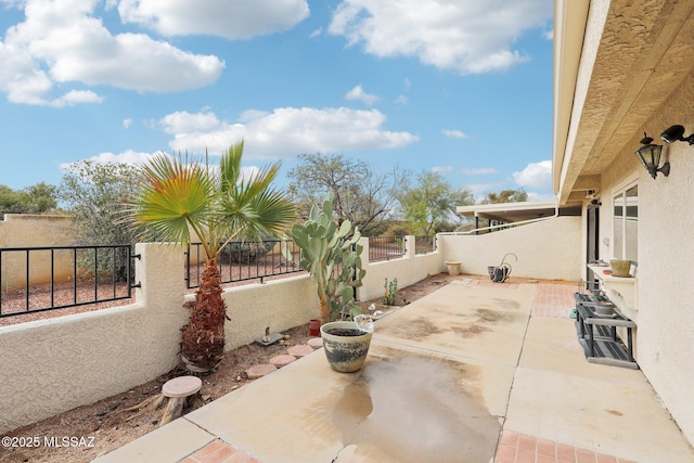 view of patio / terrace with a fenced backyard