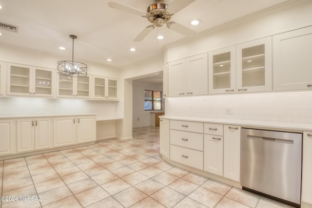 kitchen featuring light tile patterned flooring, pendant lighting, ceiling fan with notable chandelier, white cabinetry, and stainless steel dishwasher