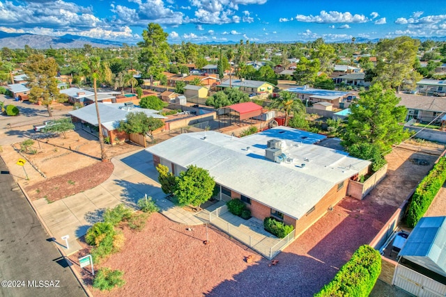 birds eye view of property featuring a mountain view