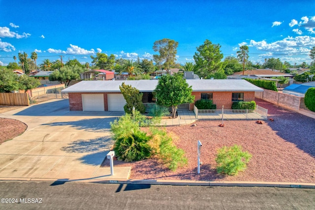 single story home featuring a garage