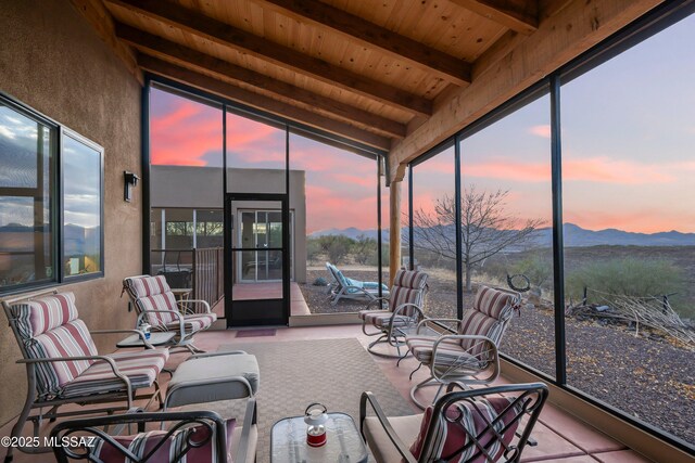 back house at dusk with a mountain view