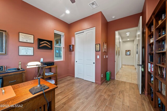 washroom featuring cabinets, light tile patterned floors, washing machine and dryer, and sink