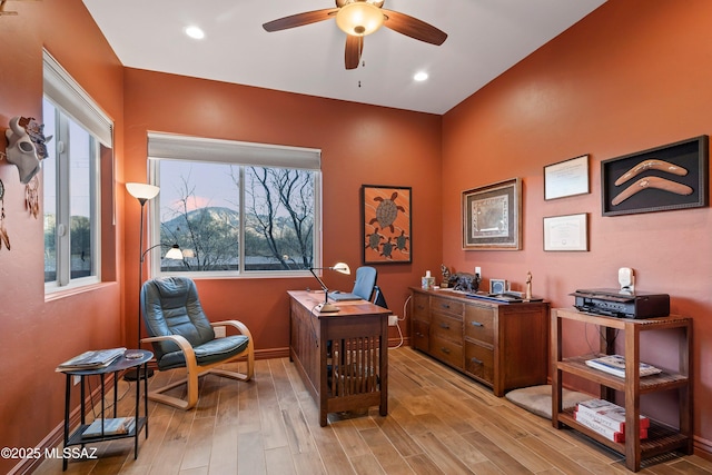 office space featuring light wood-type flooring and ceiling fan