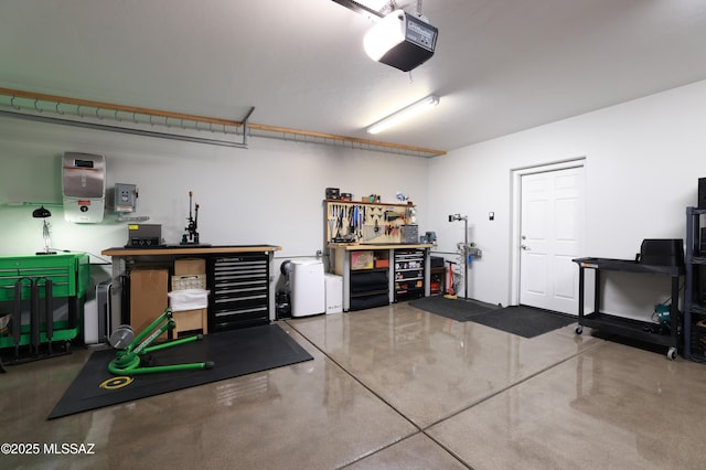 garage featuring a workshop area and a garage door opener