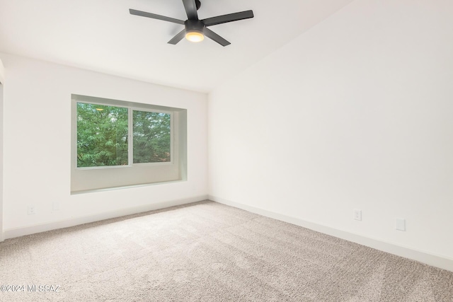 empty room with carpet and ceiling fan