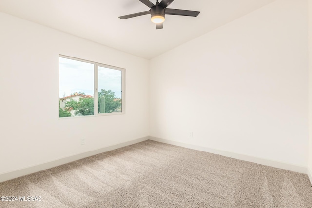 empty room featuring carpet and ceiling fan