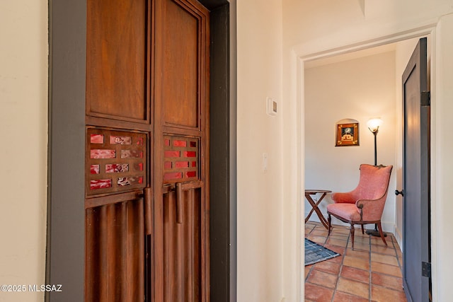 hallway with light tile patterned floors