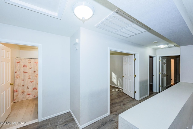 hallway featuring dark wood-type flooring