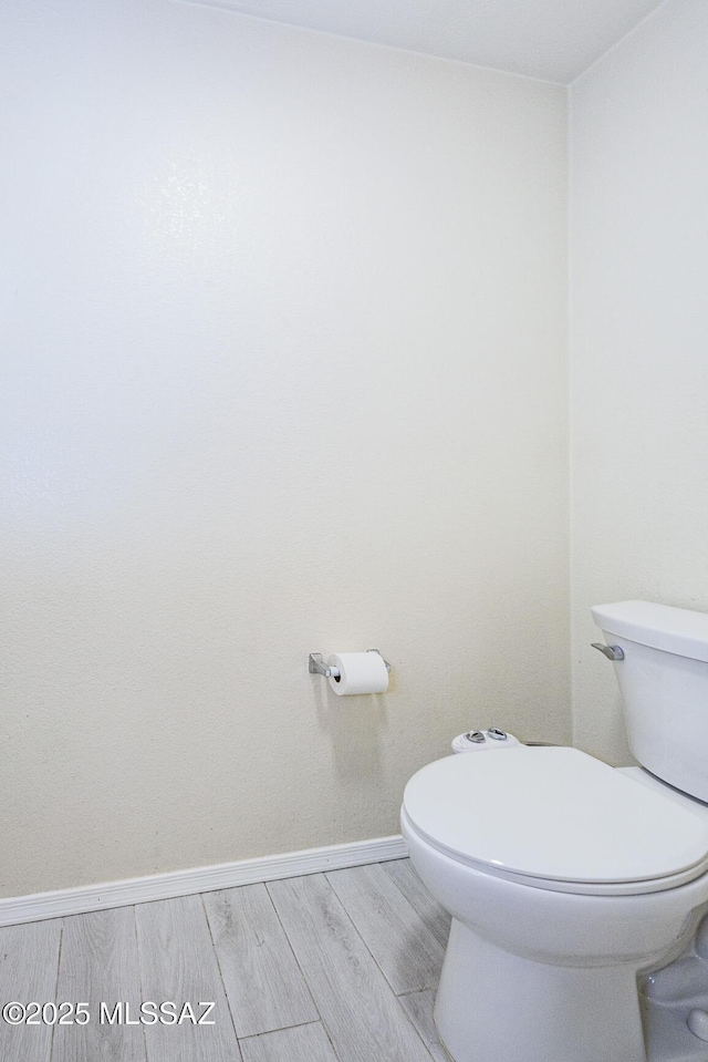 bathroom featuring toilet