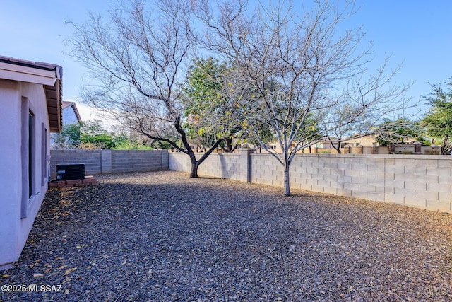 view of yard featuring central AC unit