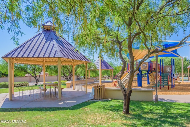 view of home's community with a playground and a yard