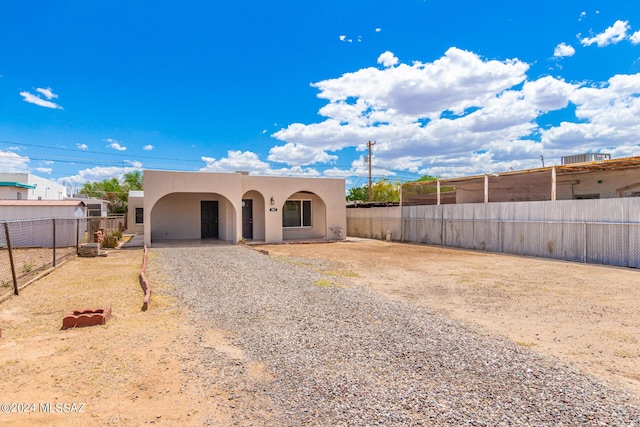 view of pueblo revival-style home