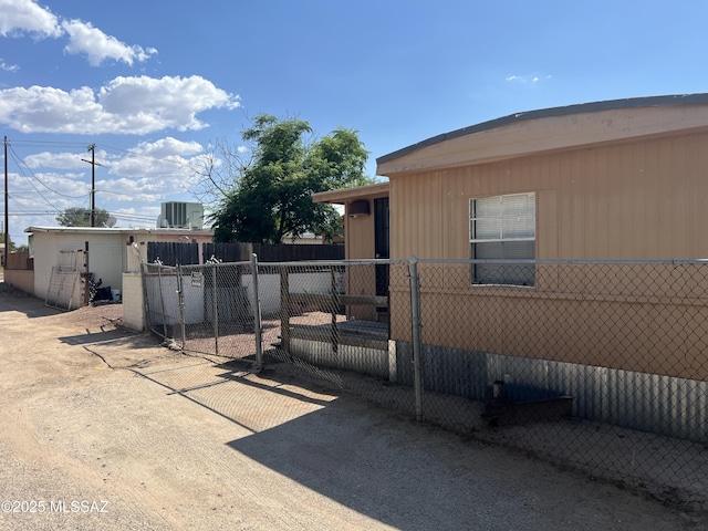 view of home's exterior with central AC unit