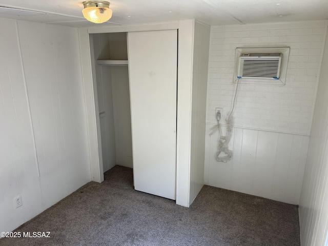 closet with a wall mounted air conditioner