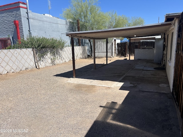 view of patio / terrace featuring a carport