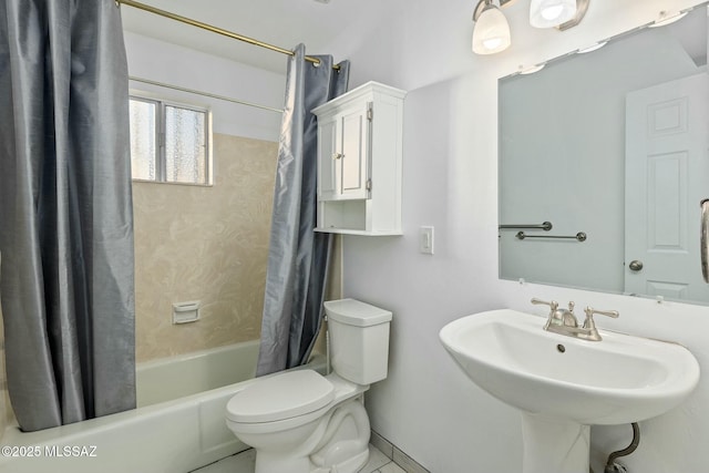 full bathroom with sink, shower / tub combo with curtain, and toilet